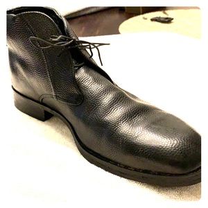 A pair of black men’s boots.